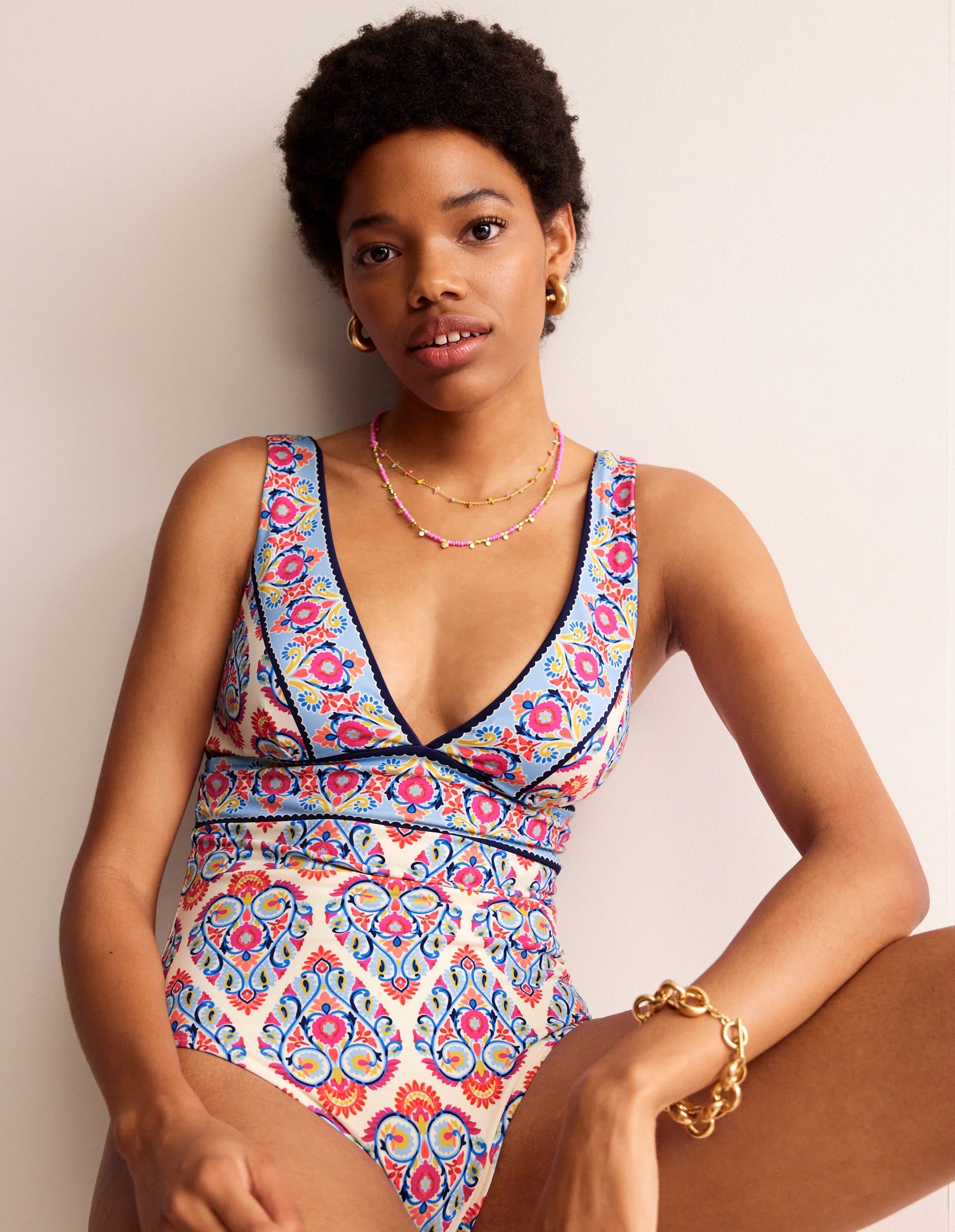 Porto V-Neck Swimsuit-Ivory. Flora Stamp