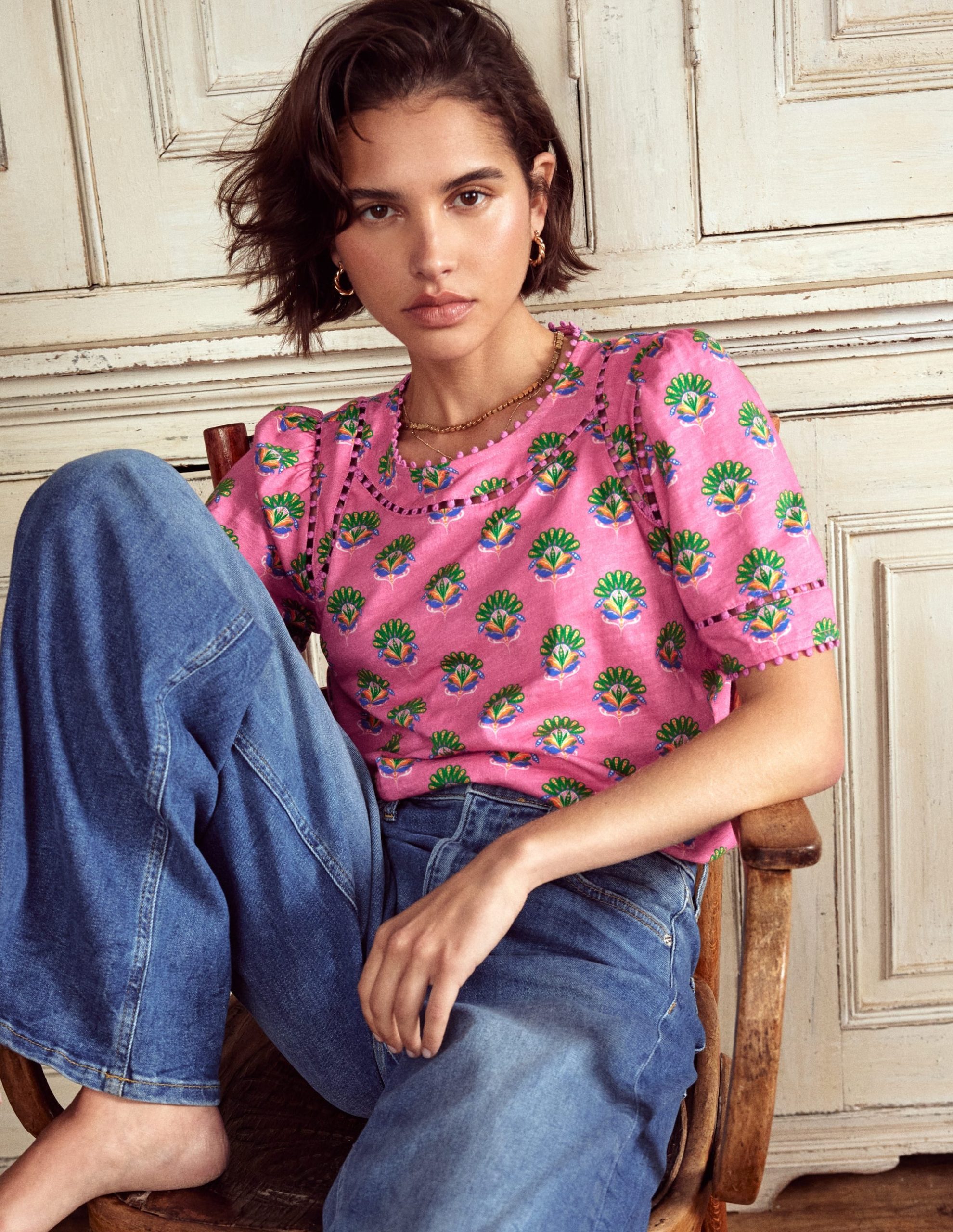 Mila Trim Detail Top-Pink. Ornamental Floral Sprig